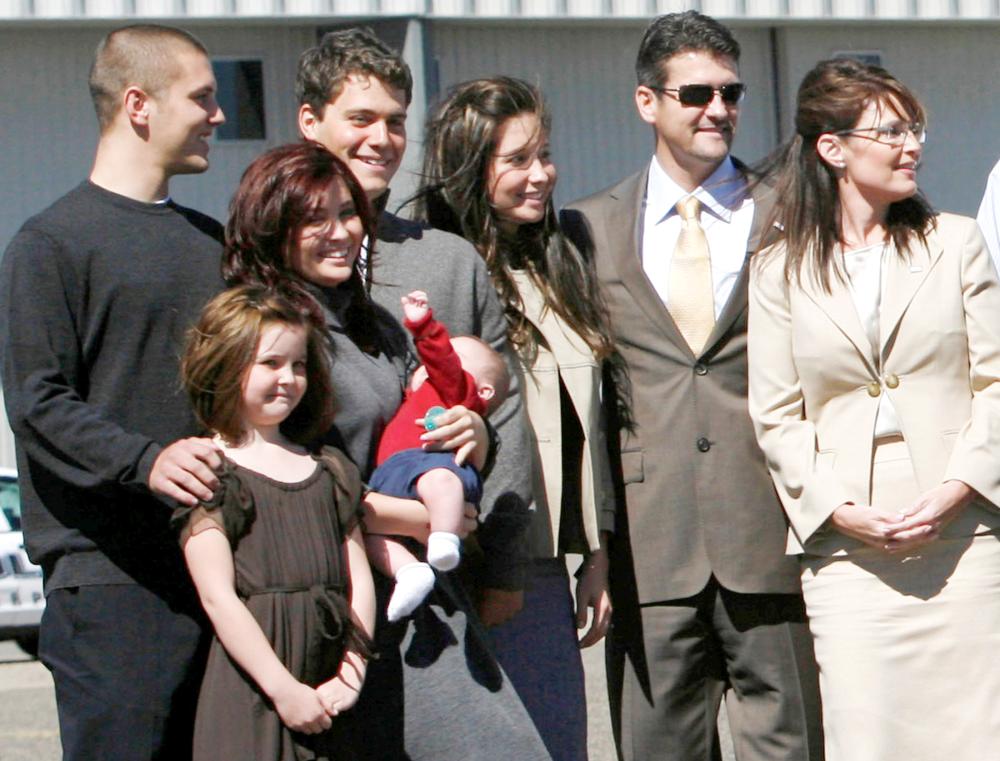US vice presidential candidate and Alaska Governor Sarah Palin, right, stands with members of her family in Minneapolis, Minnesota, in this Sept. 3, 2008 file photo. — Reuters