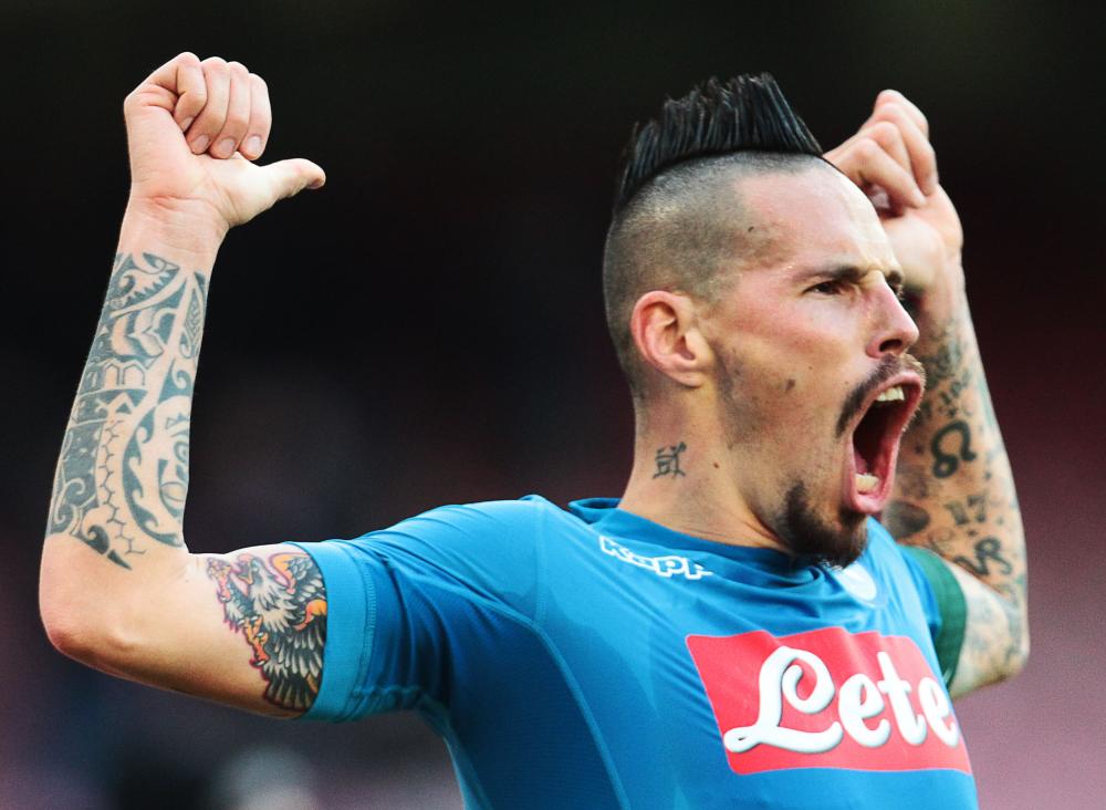 Napoli's Slovakian midfielder Marek Hamsik celebrates after scoring a goal during the Italian Serie A football match against Sampdoria at the San Paolo Stadium in Naples Saturday. — AFP
