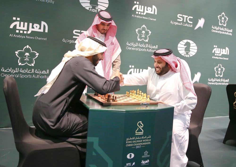 Chairman of the General Sports Authority Turki Al-Asheikh (right) and President of the Asian Chess Federation Sheikh Sultan Bin Khalifa Al-Nahyan play a game of chess after the inauguration ceremony of the King Salman World Rapid and Blitz Championships at the iconic Apex Convention Center in Riyadh on Monday evening. — SPA