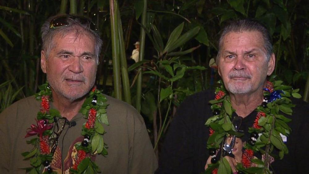 In this Dec. 24, 2017, image made from a video provided by Honolulu news station KHON, Alan Robinson and Walter Macfarlane are interviewed in Honolulu, Hawaii. - AP