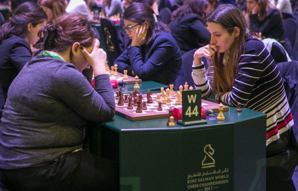 Norwegian chess player Magnus Carlsen (R) attends the King Salman World Rapid and Blitz Championships, the first international chess competition held in Saudi Arabia. — AFP