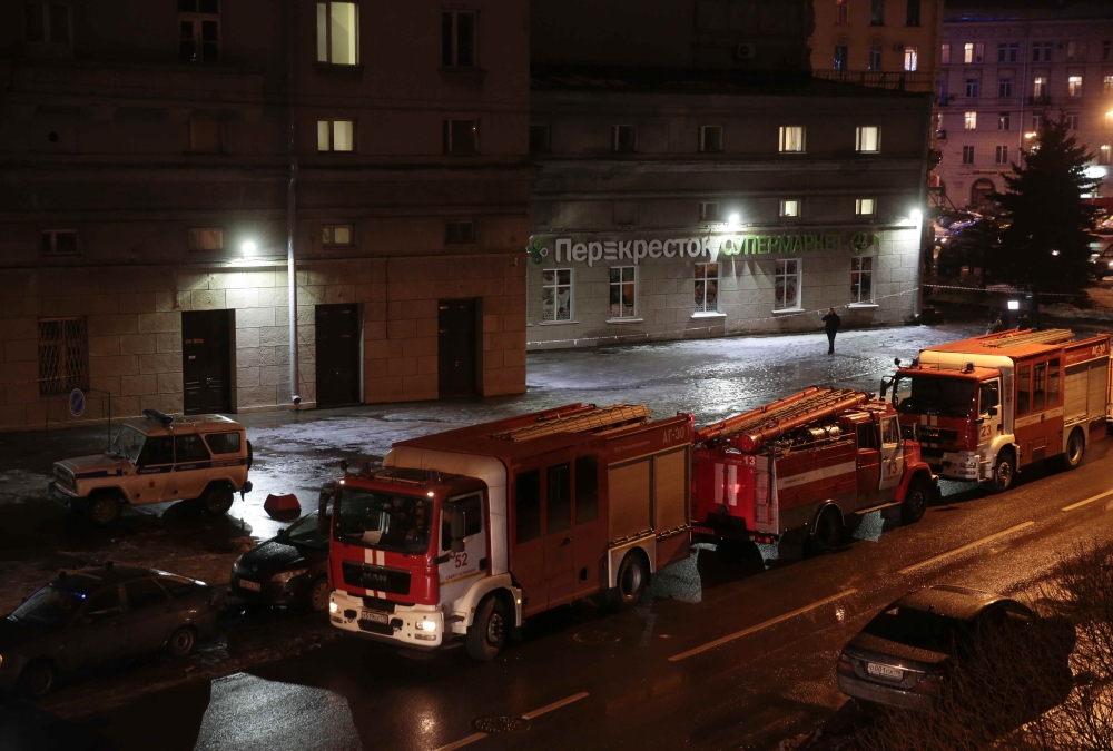 Vehicles of emergency services are parked near a supermarket after an explosion in St. Petersburg, Russia, on Wednesday. — Reuters