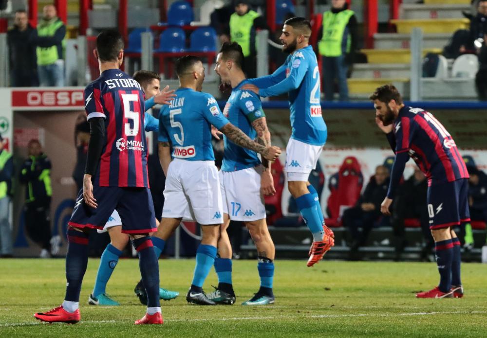 Napoli’s midfielder Marek Hamsik (C) celebrates with teammates after scoring a goal during the Italian Serie A football match against FC Crotone at the Ezio Scida Stadium in Crotone Friday. — AFP 