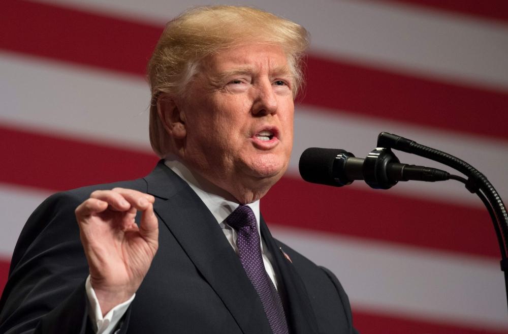 This file photo taken on December 18, 2017 shows US President Donald Trump speaking about his administration's National Security Strategy at the Ronald Reagan Building and International Trade Center in Washington, DC. — AFP