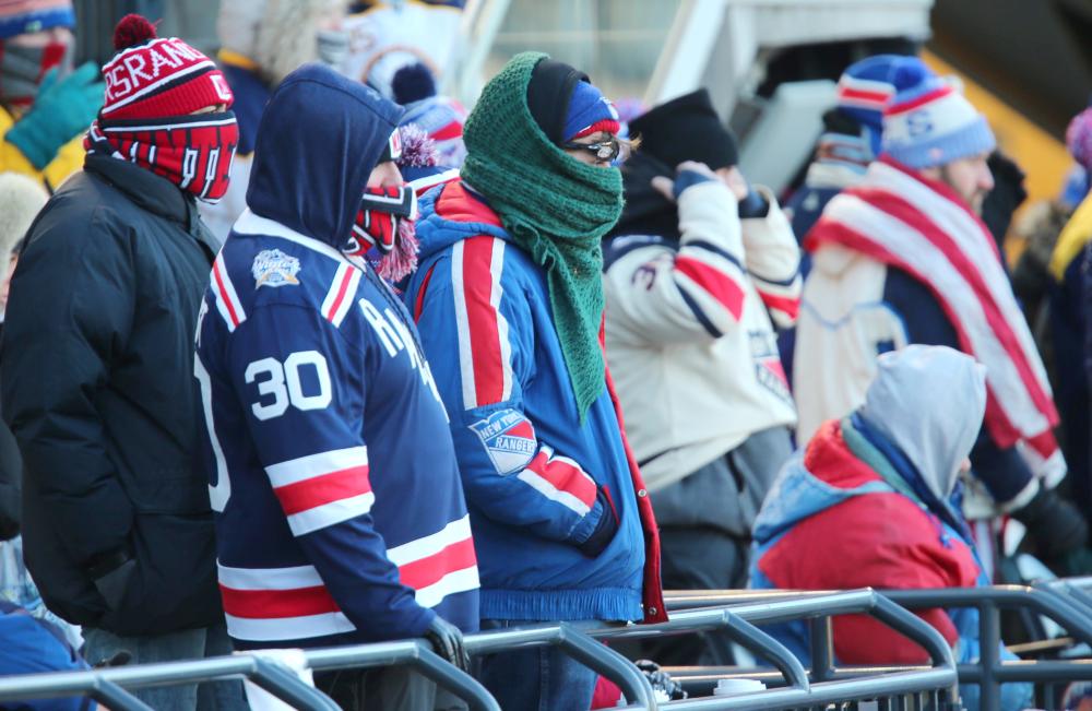Hockey fans dressed for the cold during the 2018 Winter Classic hockey game between the New York Rangers and the Buffalo Sabres at Citi Field in New York. — Reuters