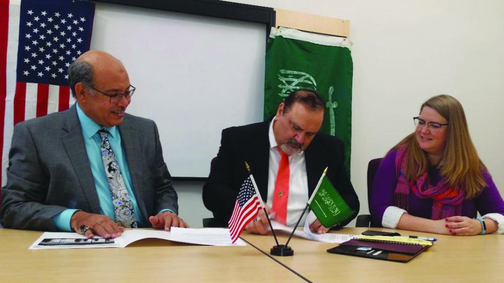 Officials of Masters Consulting and Raqi Consulting at agreement signing ceremony. — Courtesy photo