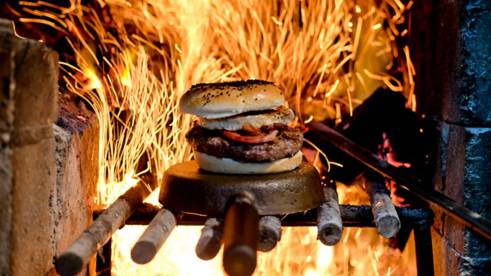 A growing number of chefs around the world have elevated wood-fire cooking to new heights at some of the most acclaimed restaurants like Spain's Asador Etxebarri in the Basque countryside. - AP