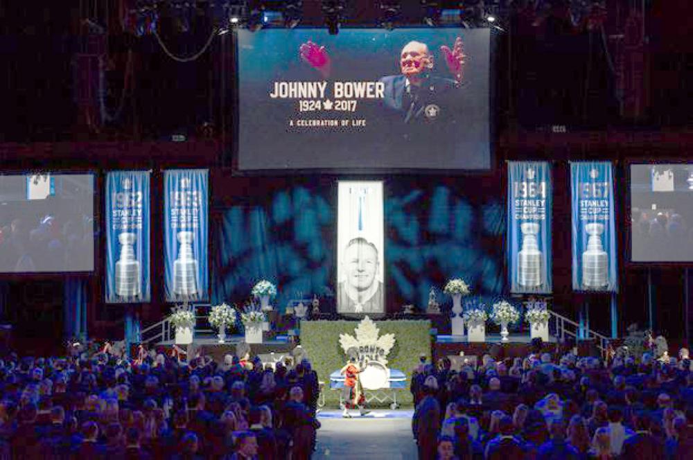 Canadian hockey legend Johnny Bower's casket is observed by fans, friends, and family at a celebration of life ceremony at the Air Canada Centre in Toronto on Wednesday.