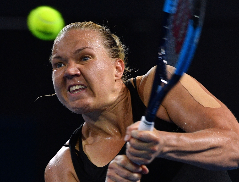 Estonia's Kaia Kanepi hits a return against Karolina Pliskova of the Czech Republic during their women's singles quarterfinal match at the Brisbane International tennis tournament at Pat Rafter Arena in Brisbane on Thursday. — AFP