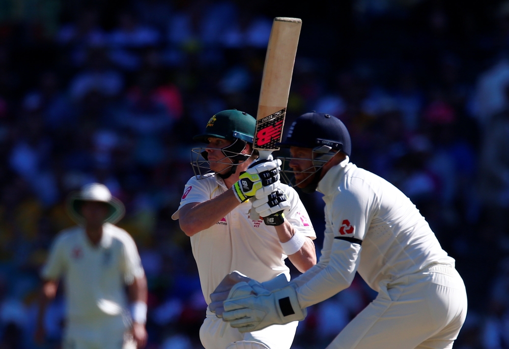 Australia's captain Steve Smith hits a boundary against England during the second day of the fifth Ashes cricket Test match in Sydney. — Reuters