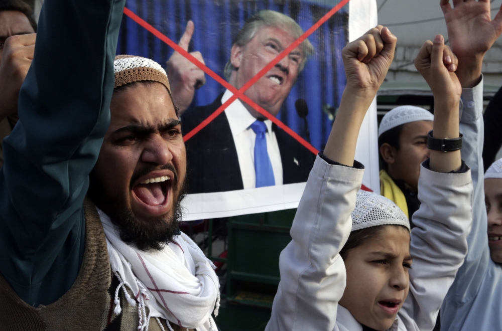 Pakistani religious students protest against US President Donald Trump in Lahore, Pakistan, on Friday. — AP