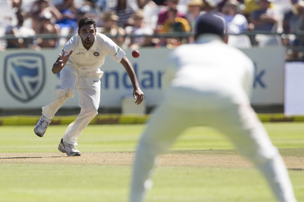 Indian bowler Bhuvneshwar Kumar, who was the pick of the pacemen with a 4-wicket haul, misses a catch on the first day of their Test match between South Africa and India at Newlands Stadium, in Cape Town, South Africa, Friday. — AP