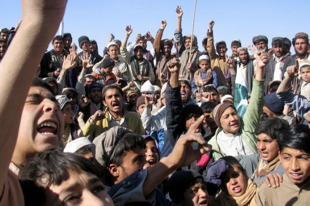 People chant slogans as they take part in an anti-US rally in Chaman, Pakistan, on Friday. — Reuters