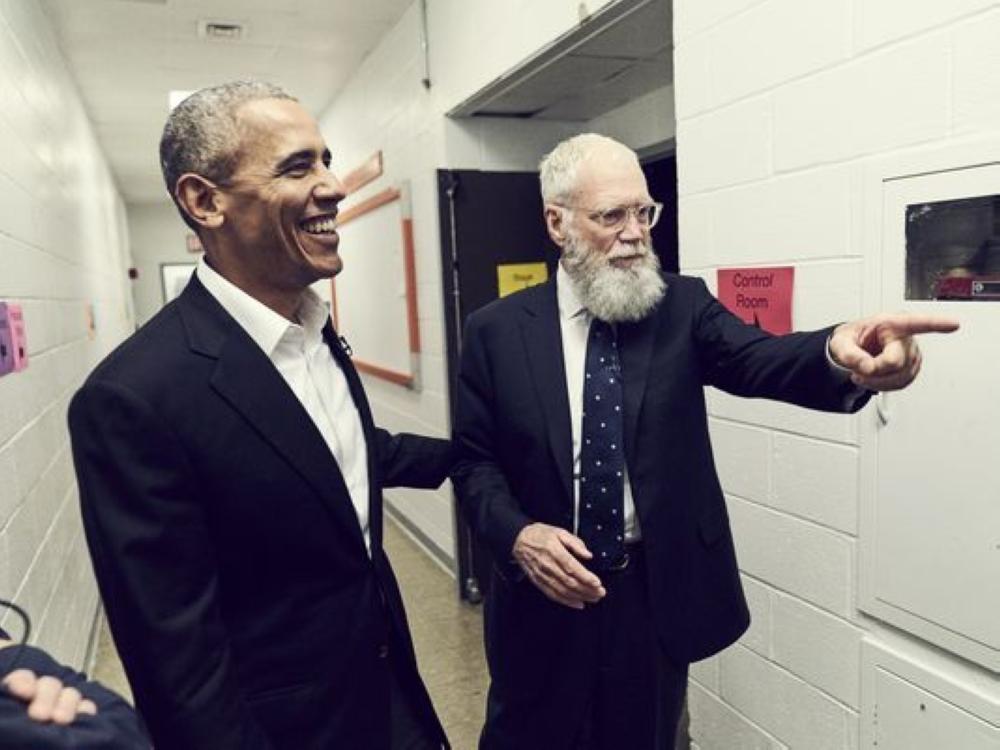 This handout photo from Netflix Inc shows former US President Barack Obama, left, with David Letterman in a scene from an episode of 