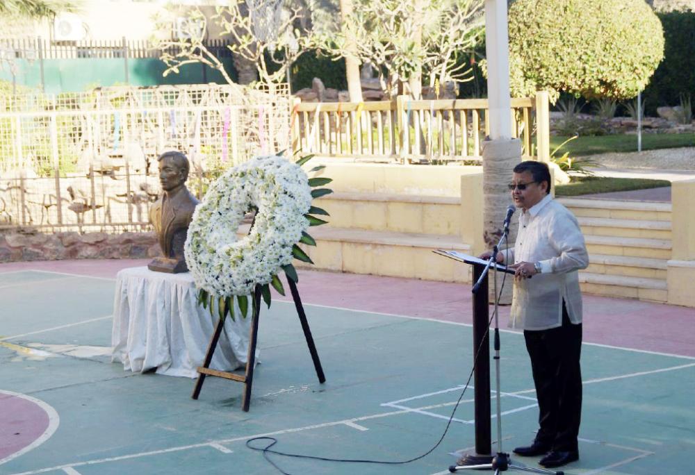 Ambassador Adnan V. Alonto reading the Message of President Rodrigo R. Duterte during the Rizal Day activity at the Philippine Embassy. 
