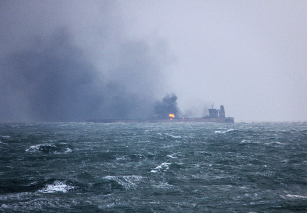 This handout photo from the Transport Ministry of China taken and released on Tuesday shows smoke and flames coming from the burning oil tanker 'Sanchi' at sea off the coast of eastern China. — AFP