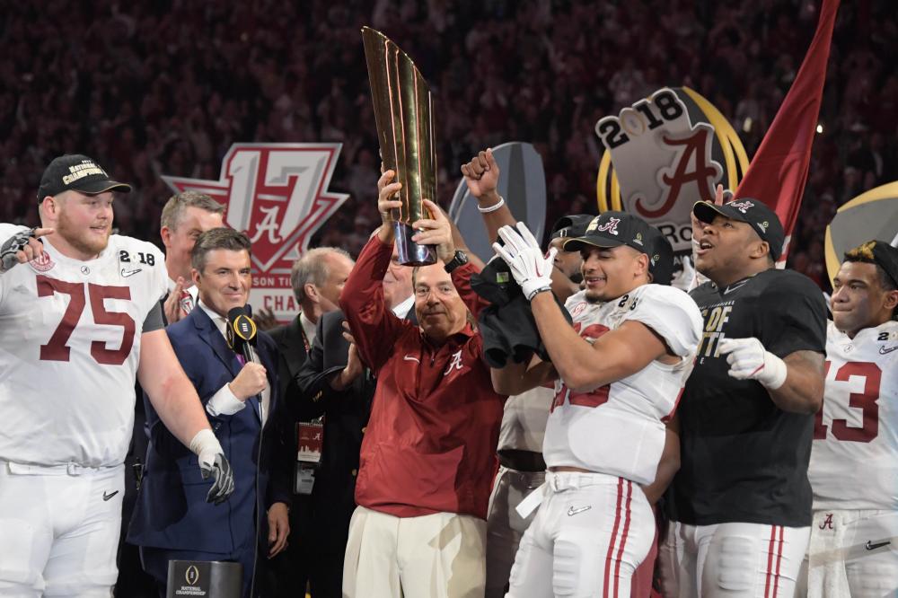 Alabama Crimson Tide’s head coach Nick Saban holds up the trophy after their win over the Georgia Bulldogs in the 2018 CFP National Championship college football game at Mercedes-Benz Stadium in Atlanta Monday. — Reuters