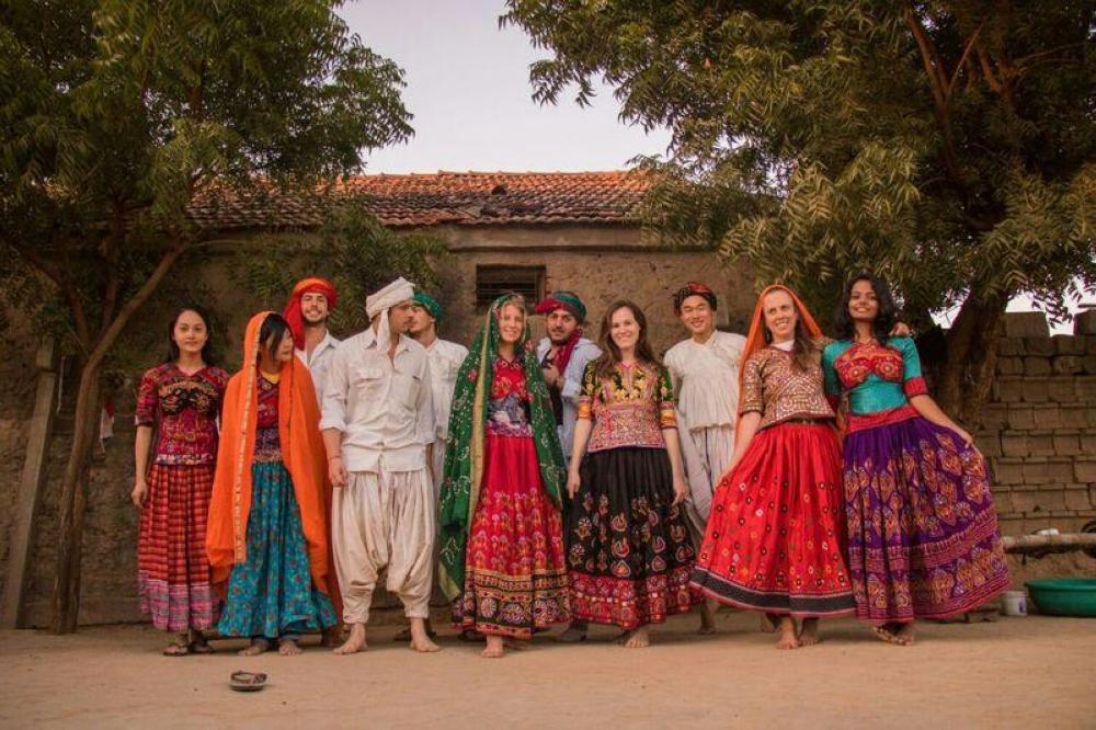 Guests at a homestay in India’s Gujarat state, where a partnership between Airbnb and local women’s organization SEWA is opening up rural homes to guests from across the world. - Thomson Reuters Foundation