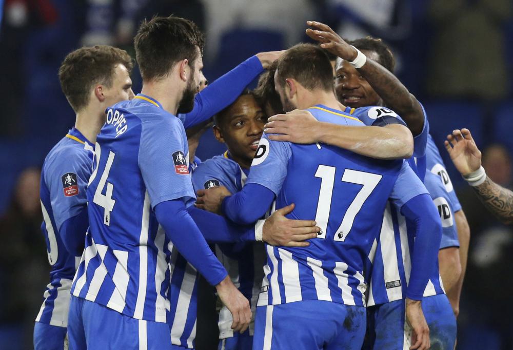 Brighton & Hove Albion’s players celebrate their second goal against Crystal Palace during their English FA Cup match at the AMEX Stadium in Brighton, England, Monday. — AP