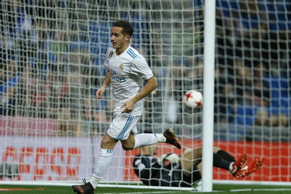 Real Madrid's Lucas Vazquez runs after scoring the opening goal past Numancia's goalkeeper Munir Mohand Mohamedi, on the ground, during the Spanish Copa del Rey round of 16 second leg soccer match at the Santiago Bernabeu stadium in Madrid, Wednesday. — AP