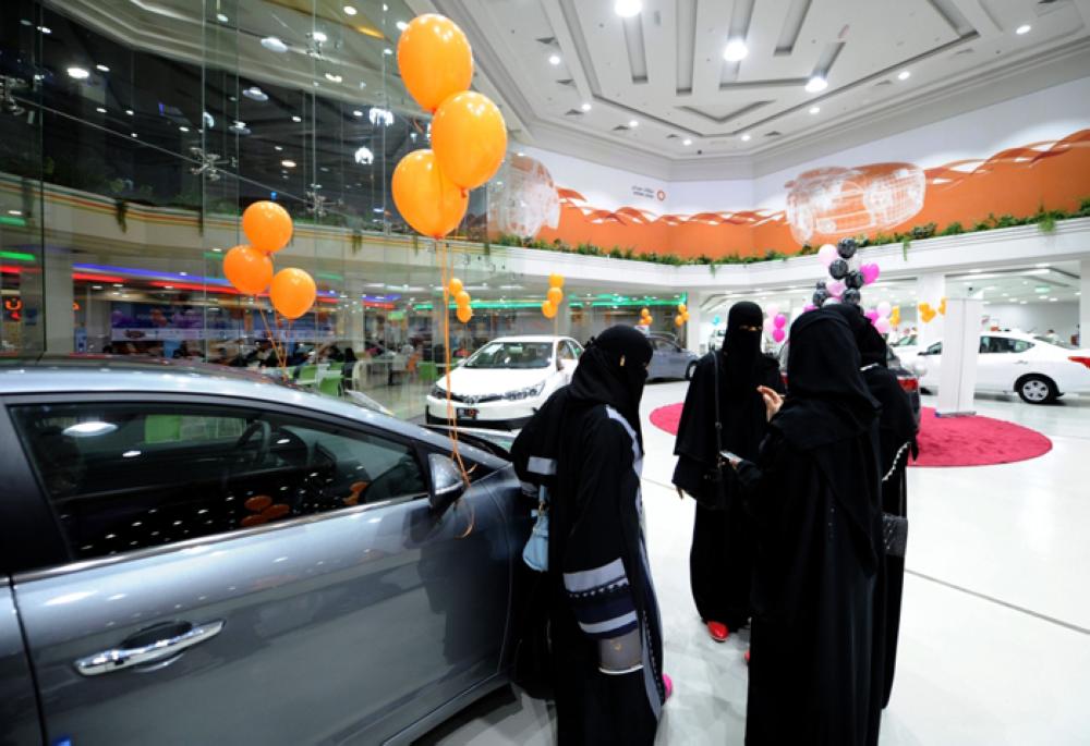 Saudi women tour a car showroom for women in Jeddah on Thursday. — AFP
