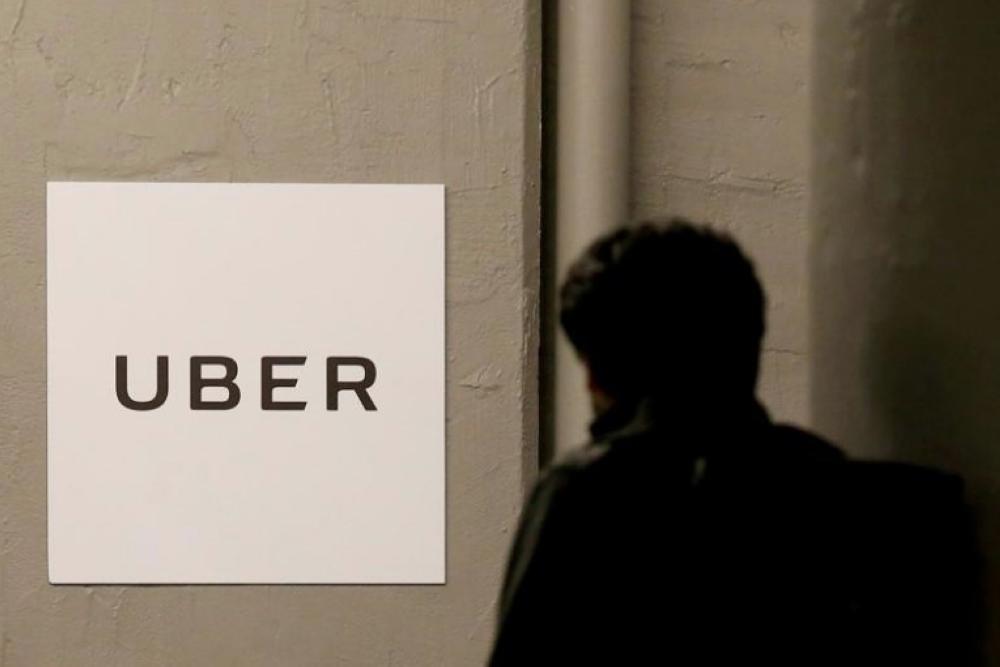 A man arrives at the Uber offices in Queens, New York, US in this file photo. — Reuters