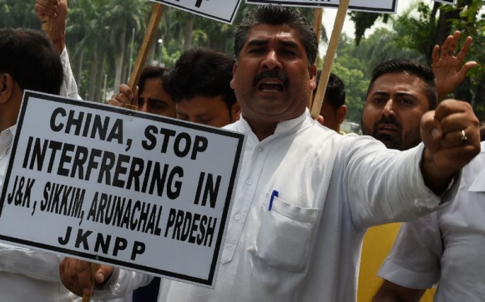 File photo shows a protest against China's aggressiveness as India and China were involved in a showdown over a disputed Himalayan plateau last year.