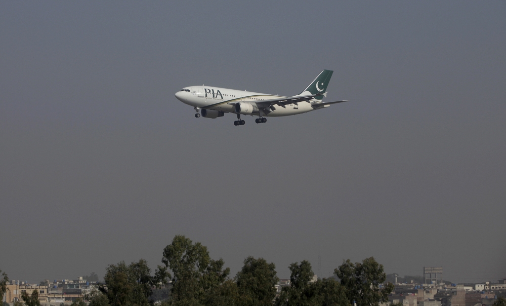 A Pakistan International Airlines (PIA) passenger plane arrives at the Benazir Bhutto International Airport in Islamabad, Pakistan in this file photo. — Reuters