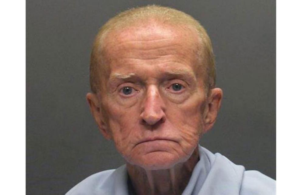 This mugshot, released by the Tucson Police Department, shows suspect Robert Francis Krebs, an 80-year-old man they say robbed a credit union at gunpoint. - AP