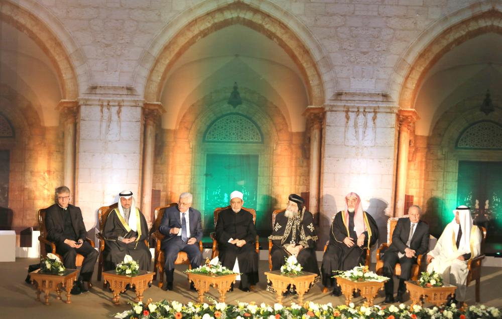 Grand Imam of Al-Azhar Sheikh Ahmed Al-Tayeb (4th left), Egypt’s Coptic Pope Tawadros II (5th left), Palestinian President Mahmoud Abbas (3rd left), Saudi Minister of Islamic Affairs, Call and Guidance Sheikh Saleh Al-Asheikh (3rd right) attend Al-Azhar’s conference on Jerusalem in Cairo on Wednesday. — Reuters