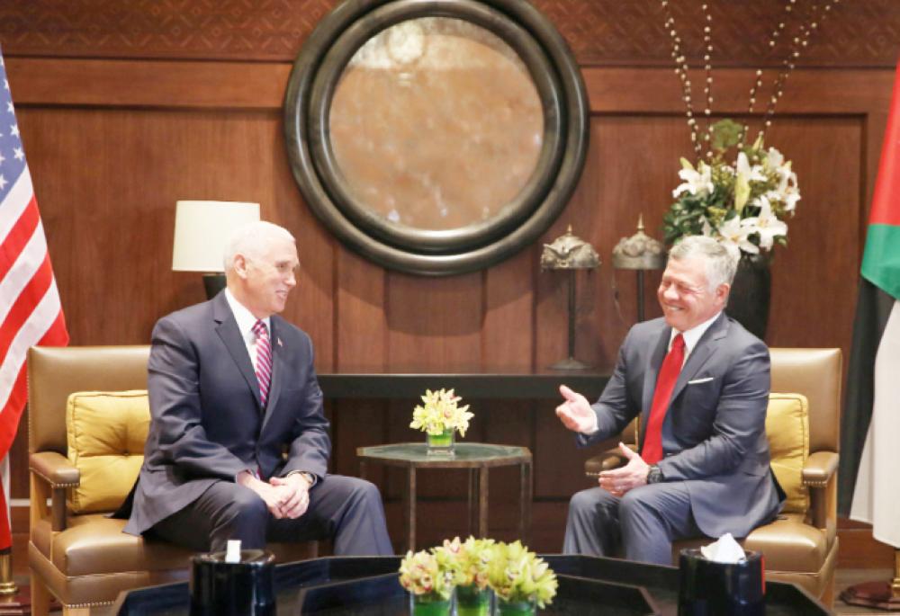 US Vice President Mike Pence (L) meets Jordan’s King Abdullah II in the capital Amman on Sunday. — AFP