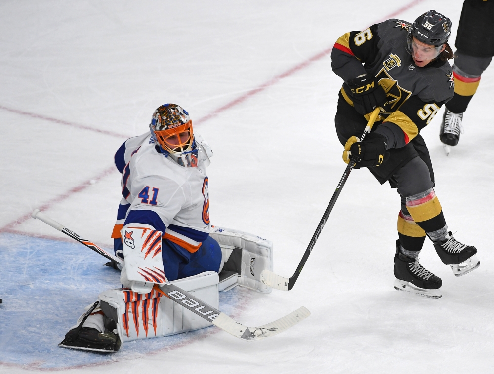 Vegas Golden Knights left wing Erik Haula (56) deflects a puck past New York Islanders goaltender Jaroslav Halak (41) to score a third period goal during a game at T-Mobile Arena. — Reuters