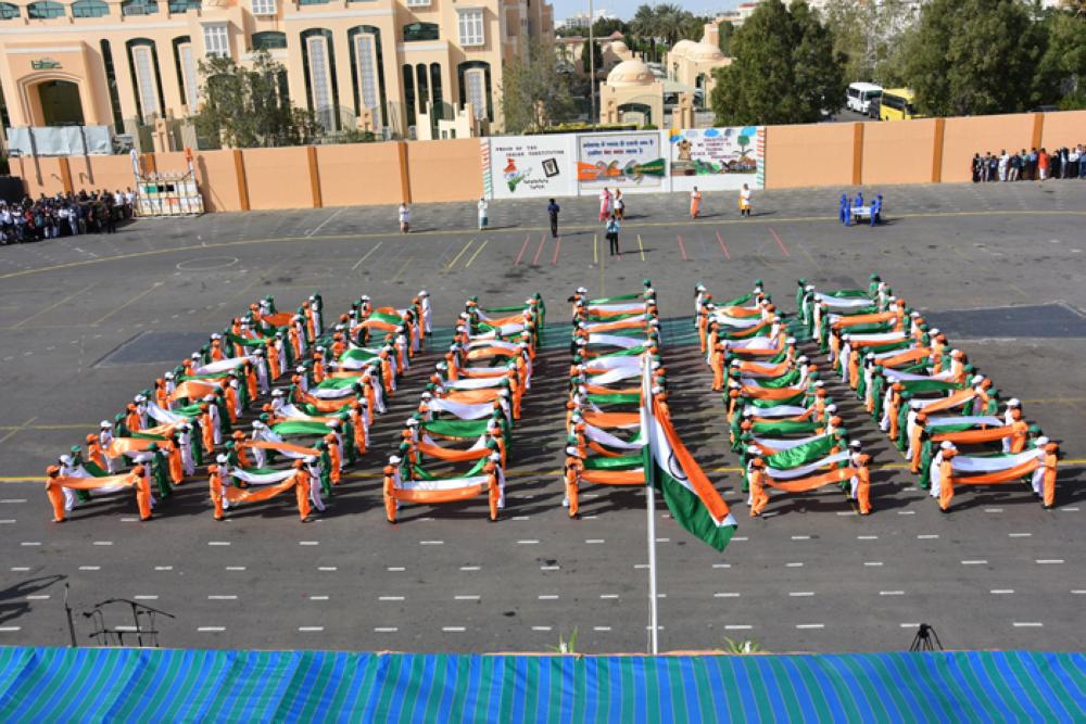 Indian Ambassador Ahmad Javed (left) and Consul General Md Noor Rahman Sheih raising the national flag respectively at the Indian Embassy in Riyadh and Consul General in Jeddah on Friday. 