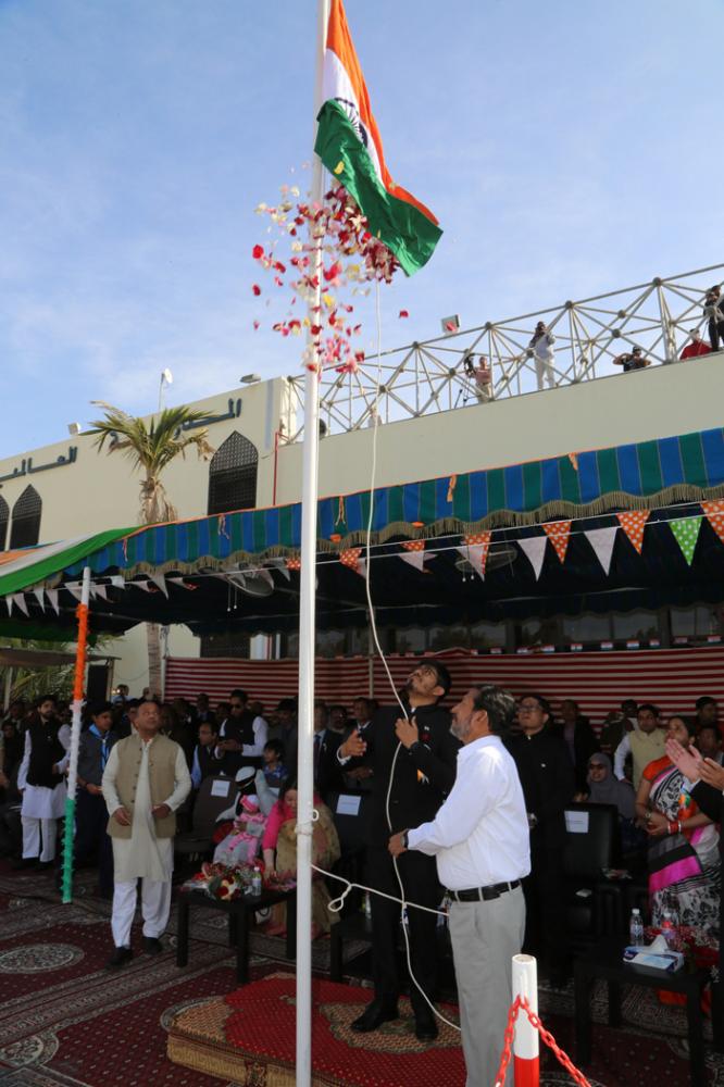 Indian Ambassador Ahmad Javed (left) and Consul General Md Noor Rahman Sheih raising the national flag respectively at the Indian Embassy in Riyadh and Consul General in Jeddah on Friday. 