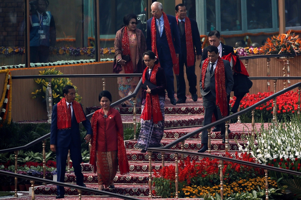 Malaysia’s Prime Minister Najib Razak, Indonesia’s President Joko Widodo, Myanmar’s State Counselor Aung San Suu Kyi, and Philippine President Rodrigo Duterte, leave after attending the Republic Day parade in New Delhi, India, on Friday. — Reuters