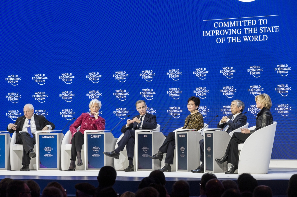 (From left to right) Martin Wolf, Associate Editor and Chief Economics Commentator, Financial Times; Christine Lagarde, Managing Director, International Monetary Fund (IMF); Member of the Board of Trustees, World Economic Forum, Mark Carney, Governor of the Bank of England; Member of the Board of Trustees, World Economic Forum, Carrie Lam, Chief Executive of Hong Kong SAR, Haruhiko Kuroda, Governor of the Bank of Japan and Mary Callahan Erdoes, Chief Executive Officer, Asset and Wealth Management, JPMorgan Chase & Co., USA during the Session “Global Economic Outlook” at the World Economic Forum in Davos on Friday. — Courtesy: WEF/Benedikt von Loebell