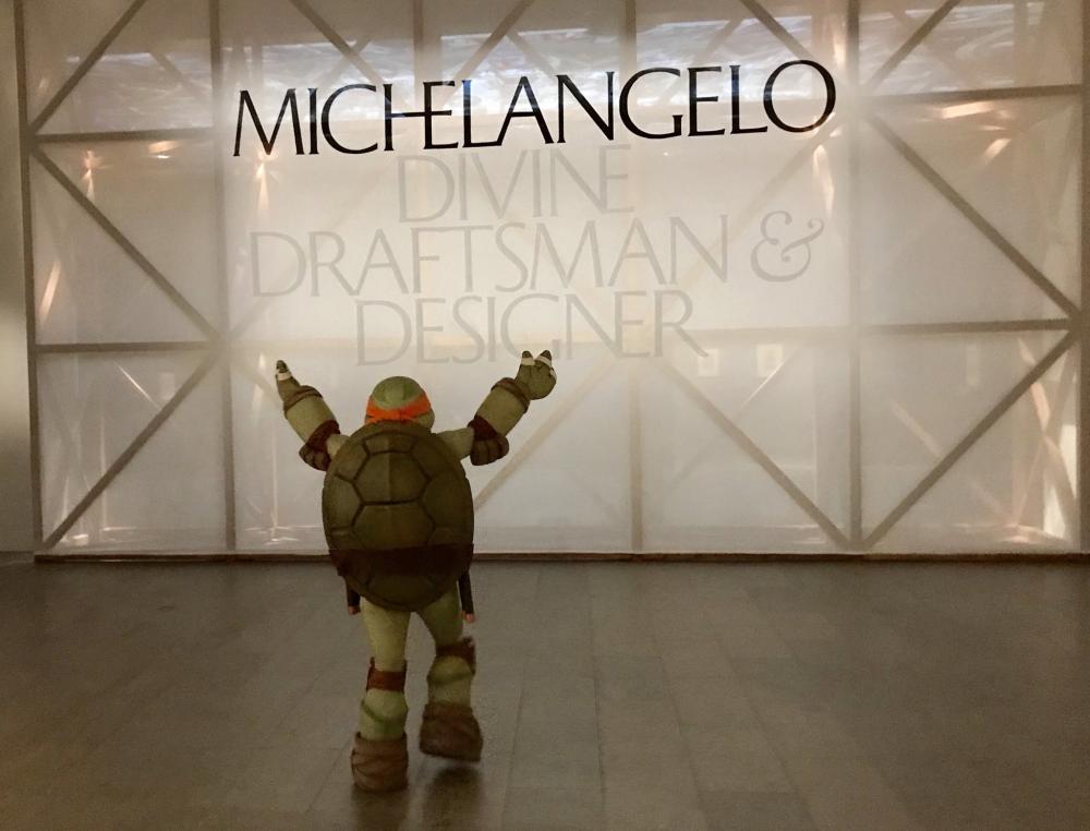 Ninja Turtle Michelangelo is seen at the entrance of the Metropolitan Museum of Art's Michelangelo exhibition in New York City.