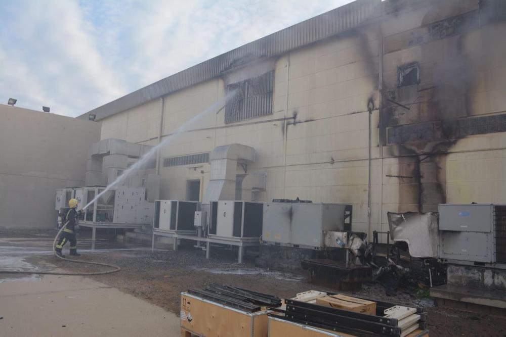 Civil Defense personnel extinguishing a fire that broke out at the electricity power transmission station in Jeddah on Monday. — Okaz photo