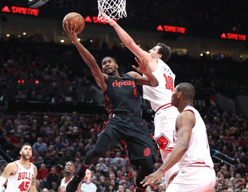 Portland Trail Blazers forward Maurice Harkless (4) shoots against Chicago Bulls forward Paul Zipser (16) in the second half at Moda Center. — Reuters