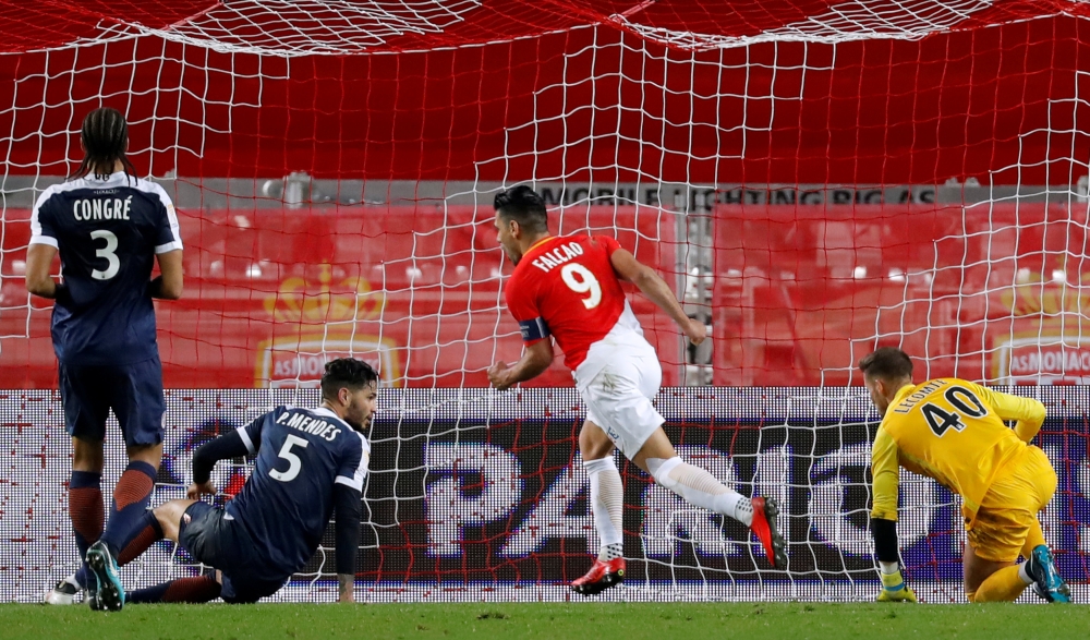 Monaco's Radamel Falcao scores their second goal against Montpellier in the Coupe de la Ligue semifinal at the Stade Louis II, Monaco on Wednesday. — Reuters