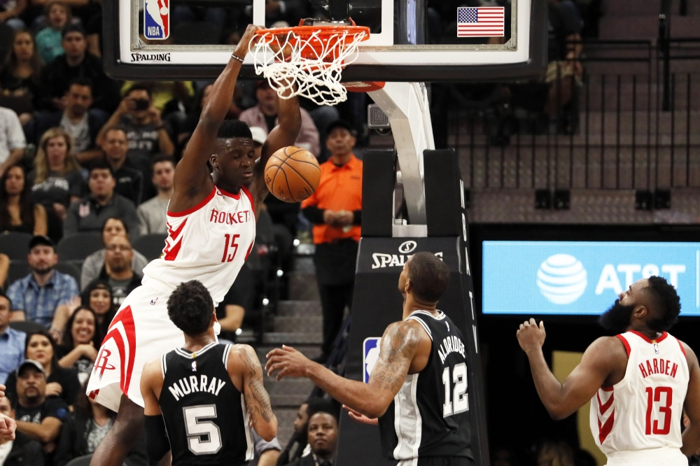 Houston Rockets center Clint Capela (15) dunks the ball against the San Antonio Spurs during the first half at AT&T Center. — Reuters