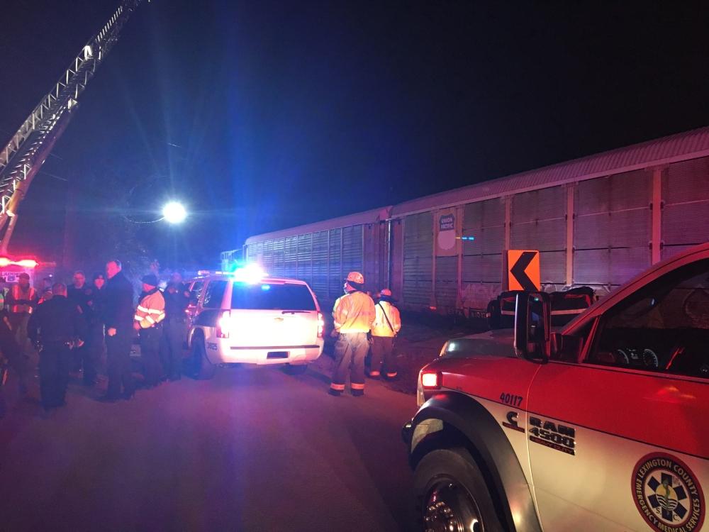 This handout photo courtesy of the County of the Lexington County Sheriff's Department shows emergency personnel at the scene of an Amtrak crash on Sunday. — AFP