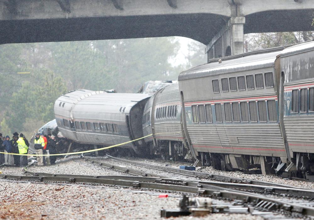 Emergency responders are at the scene after an Amtrak passenger train collided with a freight train and derailed in Cayce, South Carolina, on Sunday. — Reuters