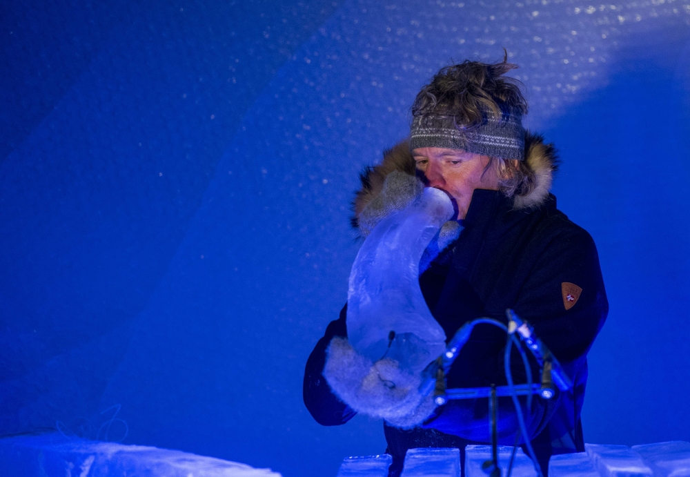 Terje Lsungset, the founder and artistic director of the Ice Music Festival, performs with a musical instrument made purely of ice during the festival. A buzzing sound from a horn made entirely of ice is anything but frozen as a concert inside an igloo with crystalline shaped instruments warms the mood in a wintery Norwegian village where temperature hits -24 Celsius. - AFP