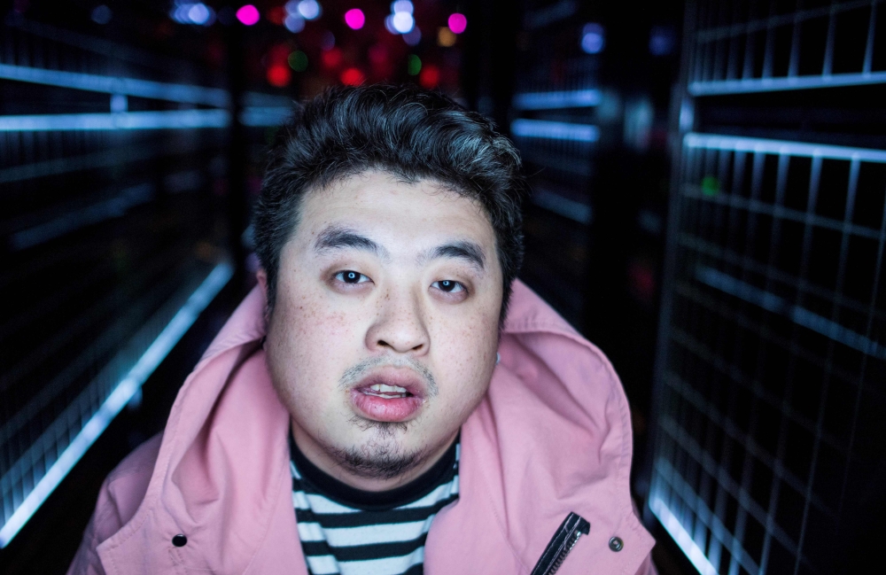 Shanghai rapper Naggy singing in his studio. Chinese rap and hip hop seemed poised to break out after a wildly popular singing show, but an abrupt backlash has tamed the swagger of artists who fear the music scene will be nipped in the bud by Communist politics. — AFP
