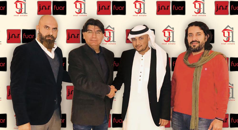 Haktan Oztunali, President of the Junior Fair, with other officials during the announcement of the launch