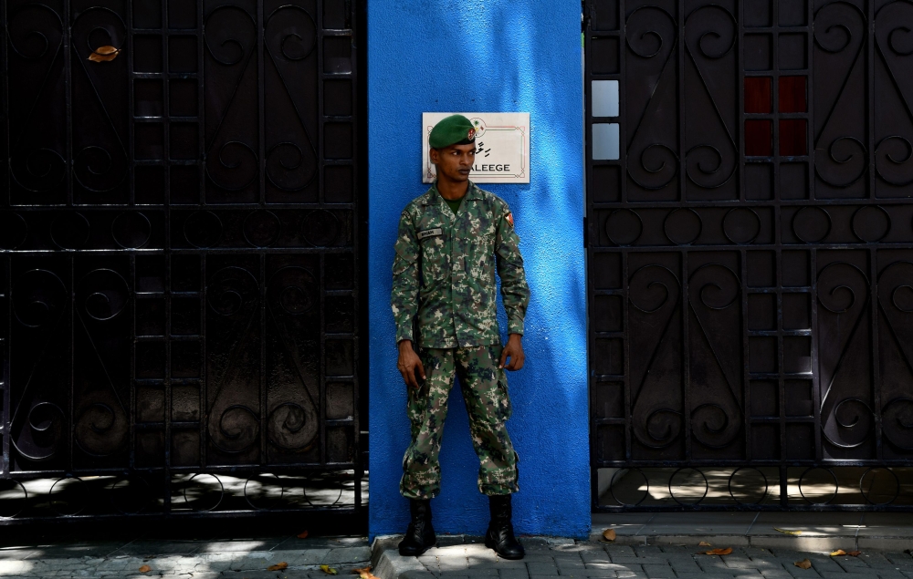 A Maldives soldier stands guard outside the president’s residence in Male in this Feb. 8, 2018 file photo. — AFP