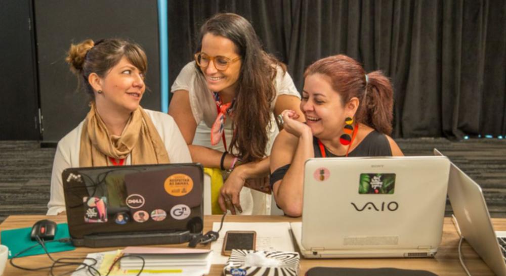 María Cristina Arboleda Puente, left, and Isabel Cristina González Ramírez, right, from Ecuador’s Sentimos Diverso attend Chicas Poderosa’s New Ventures Lab, hosted by Google in Sao Paulo, Brazil on Feb. 1, 2018. - Thomson Reuters Foundation
