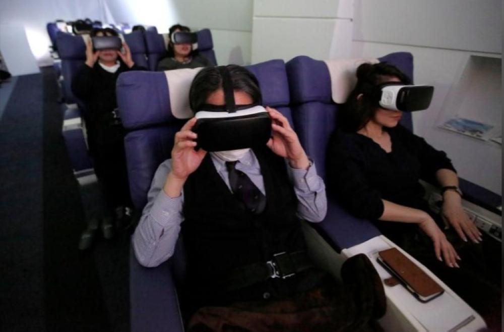 Staff dressed as flight attendants. work at the ‘First Airlines’, virtual first-class airline experience facility in Tokyo on Wednesday. — Reuters