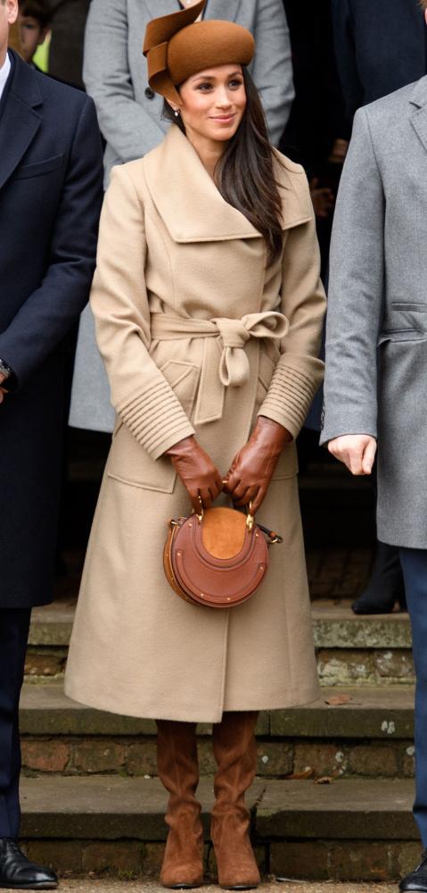 Meghan Markle is seen wearing a Sentaler coat as she arrives for a Christmas church service attended by the royal family in Norfolk, England in this Dec. 25, 2017 file photo. - AFP